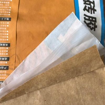 أكياس أسمنت ورقية مخصصة للطباعة السطحية من طبقتين 80 جرامًا لكل متر مربع، وأكياس أسمنت ورقية من طبقة واحدة مغلفة بطبقة فيلم متعددة الجدران مقاومة للرطوبة لمادة لاصقة للبلاط بوزن 20 كجم تدوم طويلاً