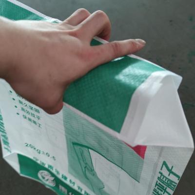 20kg 25kg بلاستيكي PP النسيج كتلة الصمام السفلي كيس الأسمنت الصمام PP مربع كيس الصمام السفلي